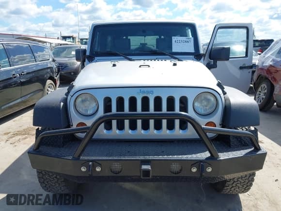 ✅ 2008 Jeep Wrangler Unlimited Rubicon • VIN: 1J4GA69178L550598 • Лот: 42232887. Опубликован ранее на IAAI с пробегом 99 637 миль. Бесплатный доступ к архиву аукционных продаж из США и подробный отчёт об истории автомобиля на DreamBid. Изображение 6.