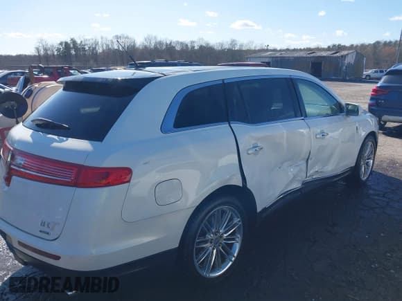 ✅ 2013 Lincoln MKT EcoBoost • VIN: 2LMHJ5AT8DBL55167 • Lot: 41894396. Listed on IAAI with 121,114 mi. Free auction sales archive from the USA and detailed vehicle history report at DreamBid. Image 4.