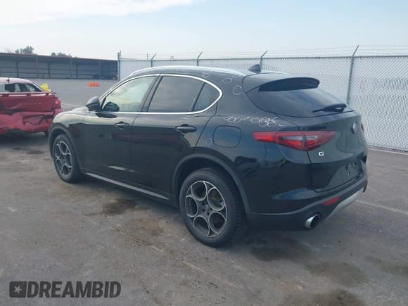 ✅ 2018 Alfa Romeo Stelvio • VIN: ZASFAKAN5J7B62090 • Лот: 42590349. Опубликован ранее на IAAI с пробегом 72 559 миль. Бесплатный доступ к архиву аукционных продаж из США и подробный отчёт об истории автомобиля на DreamBid. Изображение 3.
