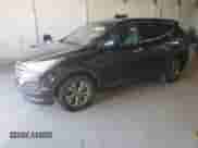2015 Hyundai Santa Fe с VIN 5XYZTDLB3FG279501, выставлен на аукционе Copart как лот 86260465 с пробегом 142 263 миль миль и Чистый • Clean title. История ставок и продаж доступна на DreamBid. Изображение 1.