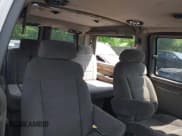 ✅ 2004 Chevrolet Express Passenger • VIN: 1GBFG15T041157045 • Lot: 42486752. Listed on IAAI with 319,752 mi. Free auction sales archive from the USA and detailed vehicle history report at DreamBid. Image 8.