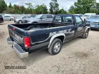 1996 Dodge Dakota SLT z VIN 1B7FL26X6TS500464, wystawiony jako Copart lot #63808495 z przebiegiem 177 515 mil mil oraz Szkoda całkowita • Salvage title. Historia ofert i sprzedaży dostępna na DreamBid. Obrazek 3.