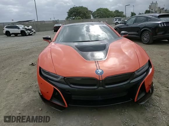 ✅ 2016 BMW i8 • VIN: WBY2Z2C51GV675742 • Лот: 82345595. Опубликован ранее на Copart с пробегом 67 139 миль. Бесплатный доступ к архиву аукционных продаж из США и подробный отчёт об истории автомобиля на DreamBid. Изображение 13.