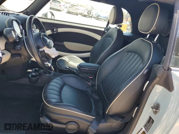 ✅ 2014 MINI Convertible • VIN: WMWZN3C56ET861316 • Lot: 67773055. Listed on Copart with 70,952 mi. Free auction sales archive from the USA and detailed vehicle history report at DreamBid. Image 7.