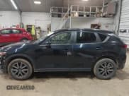 ✅ 2018 Mazda CX-5 Touring • VIN: JM3KFBCM2J0380100 • Lot: 43777906. Wystawiony na IAAI z przebiegiem 108 960 mil. Bezpłatny archiwum sprzedaży aukcyjnych z USA i szczegółowy raport historii pojazdu na DreamBid. Zdjęcie 14.