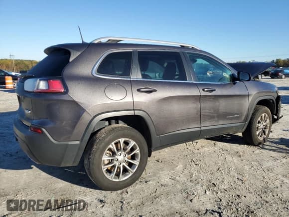 ✅ 2021 Jeep Cherokee 80th Anniversary • VIN: 1C4PJMMX2MD141631 • Lot: 90995015. Listed on Copart with 102,607 mi. Free auction sales archive from the USA and detailed vehicle history report at DreamBid. Image 3.