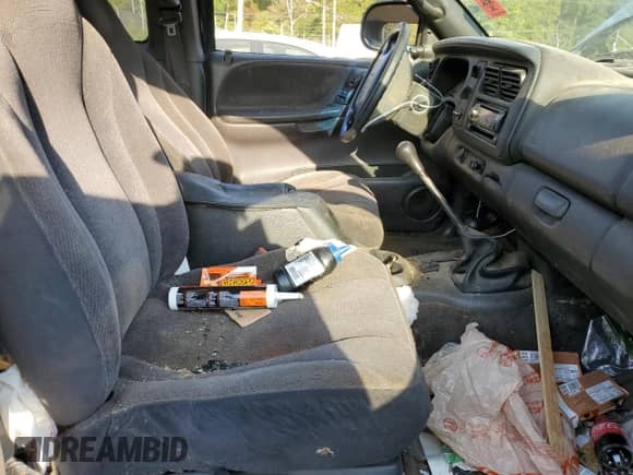 2000 Dodge Dakota Sport z VIN 1B7GG22N2YS659373, wystawiony jako Copart lot #75728094 z przebiegiem Nie podano mil oraz Szkoda całkowita • Salvage title. Historia ofert i sprzedaży dostępna na DreamBid. Obrazek 7.