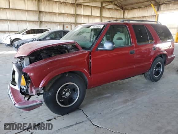1995 Chevrolet Blazer z VIN 1GNCS13W8S2238495, wystawiony jako Copart lot #74829034 z przebiegiem 199 884 mil mil oraz Szkoda całkowita • Salvage title. Historia ofert i sprzedaży dostępna na DreamBid. Obrazek 1.