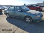 ✅ 2000 Kia Sephia • VIN: KNAFB1213Y5851737 • Lot: 82178085. Wystawiony na Copart z przebiegiem 68 424 mil. Bezpłatny archiwum sprzedaży aukcyjnych z USA i szczegółowy raport historii pojazdu na DreamBid. Zdjęcie 4.