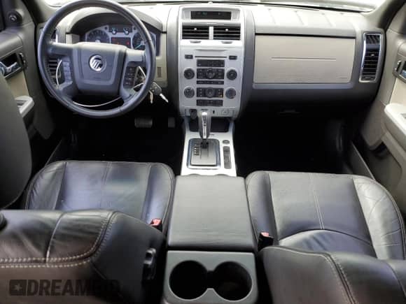 2011 Mercury Mariner z VIN 4M2CN8B73BKJ06886, wystawiony jako Copart lot #50308485 z przebiegiem 118 584 mil mil oraz Szkoda całkowita • Salvage title. Historia ofert i sprzedaży dostępna na DreamBid. Obrazek 8.