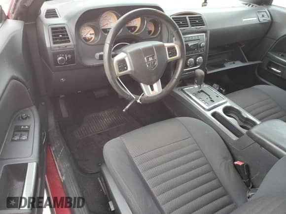 2012 Dodge Challenger SXT z VIN 2C3CDYAG9CH210824, wystawiony jako Copart lot #76201764 z przebiegiem 97 698 mil mil oraz Nie do naprawy • Non repairable. Historia ofert i sprzedaży dostępna na DreamBid. Obrazek 8.