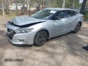 ✅ 2016 Nissan Maxima SL • VIN: 1N4AA6AP9GC406406 • Lot: 41954790. Wystawiony na IAAI z przebiegiem 139 380 mil. Bezpłatny archiwum sprzedaży aukcyjnych z USA i szczegółowy raport historii pojazdu na DreamBid. Zdjęcie 17.