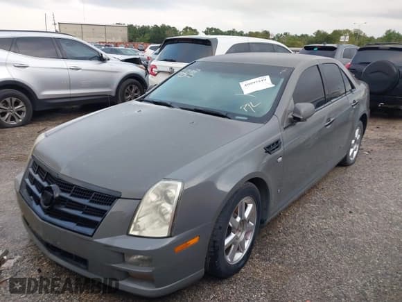 ✅ 2008 Cadillac STS RWD • VIN: 1G6DW67V380125903 • Lot: 40895449. Listed on IAAI with 102,873 mi. Free auction sales archive from the USA and detailed vehicle history report at DreamBid. Image 2.