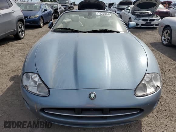 ✅ 2006 Jaguar XK XK8 • VIN: SAJDA42CX62A45610 • Лот: 75286034. Опубликован ранее на Copart с пробегом Не указан. Бесплатный доступ к архиву аукционных продаж из США и подробный отчёт об истории автомобиля на DreamBid. Изображение 5.