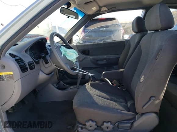 2005 Hyundai Accent GLS z VIN KMHCG35C55U337255, wystawiony jako Copart lot #43761985 z przebiegiem 192 585 mil mil oraz Szkoda całkowita • Salvage title. Historia ofert i sprzedaży dostępna na DreamBid. Obrazek 7.