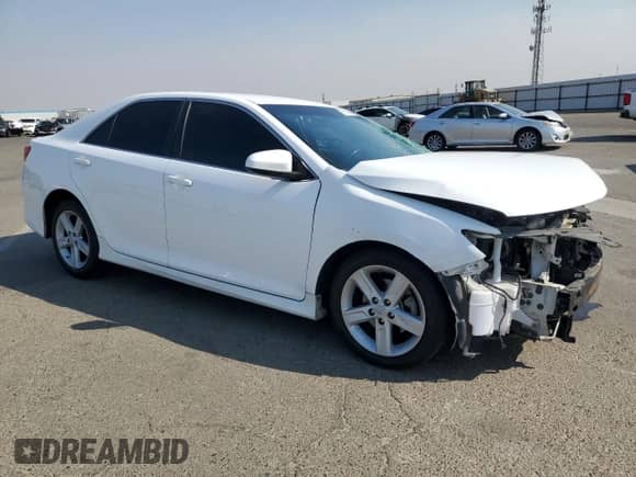 2012 Toyota Camry LE with VIN 4T1BF1FK1CU135096, listed as a Copart auction lot 71156545 with 203,293 mi miles and Salvage title. Bid and sale history available at DreamBid. Image 4.