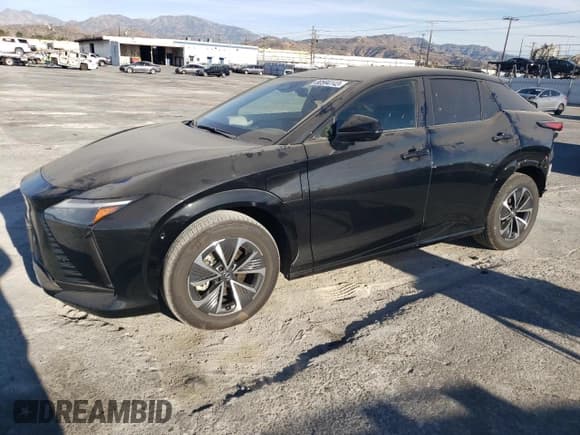 ✅ 2023 Lexus RZ 450e Premium • VIN: JTJAAAAB9PA007621 • Лот: 80594143. Опубликован ранее на Copart с пробегом 7 673 миль. Бесплатный доступ к архиву аукционных продаж из США и подробный отчёт об истории автомобиля на DreamBid. Изображение 1.