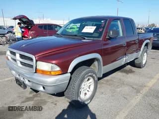 ✅ 2002 Dodge Dakota SLT • VIN: 1B7HG48Z52S605390 • Lot: 41670007. Wystawiony na IAAI z przebiegiem 238 351 mil. Bezpłatny archiwum sprzedaży aukcyjnych z USA i szczegółowy raport historii pojazdu na DreamBid. Zdjęcie 2.