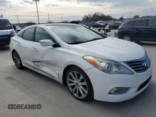 2013 Hyundai Azera with VIN KMHFH4JGXDA245793, listed as a Copart auction lot 82435324 with 144,269 mi miles and Clean title. Bid and sale history available at DreamBid. Image 4.