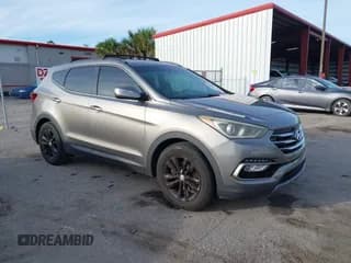 ✅ 2017 Hyundai Santa Fe 2.0T • VIN: 5XYZU4LA0HG487276 • Lot: 41441697. Listed on IAAI with 118,248 mi. Free auction sales archive from the USA and detailed vehicle history report at DreamBid. Image 1.