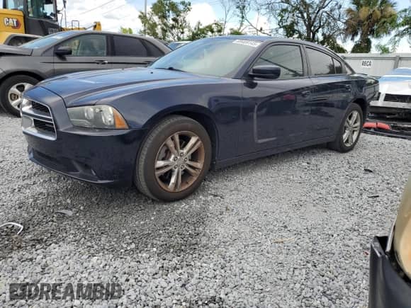 2012 Dodge Charger SXT Plus с VIN 2C3CDXJGXCH161644, выставлен на аукционе Copart как лот 69469145 с пробегом 181 013 миль миль и Списание • Salvage title. История ставок и продаж доступна на DreamBid. Изображение 1.