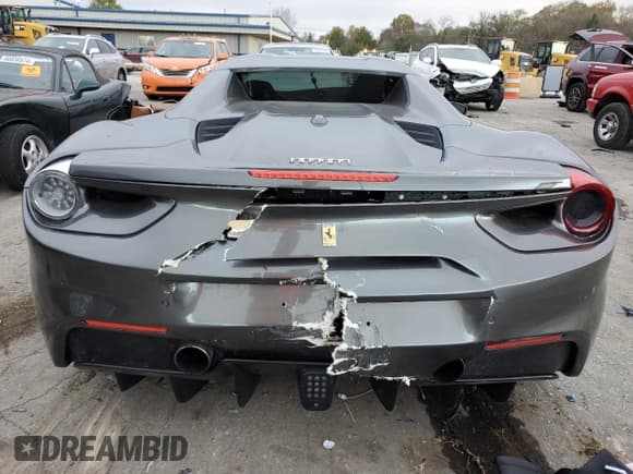 ✅ 2018 Ferrari 488 • VIN: ZFF80AMA6J0231516 • Лот: 79886954. Опубликован ранее на Copart с пробегом Не указан. Бесплатный доступ к архиву аукционных продаж из США и подробный отчёт об истории автомобиля на DreamBid. Изображение 6.