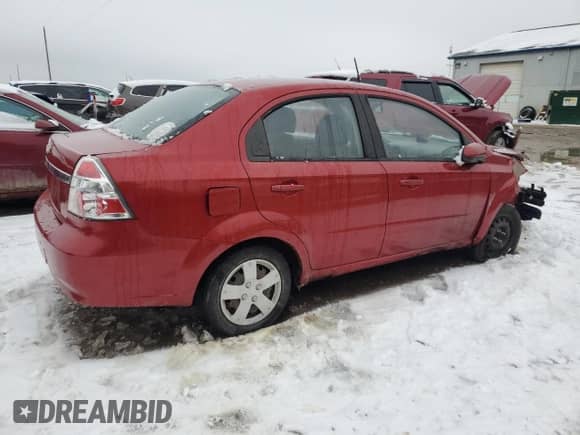 2009 Chevrolet Aveo 1LT z VIN KL1TD56E09B341294, wystawiony jako Copart lot #86139404 z przebiegiem 121 471 mil mil oraz Czysty tytuł • Clean title. Historia ofert i sprzedaży dostępna na DreamBid. Obrazek 3.