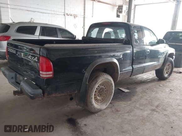 ✅ 2002 Dodge Dakota • VIN: 1B7GG12X12S702488 • Lot: 42346302. Listed on IAAI with 74,952 mi. Free auction sales archive from the USA and detailed vehicle history report at DreamBid. Image 4.