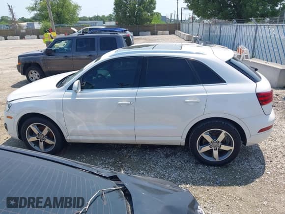 ✅ 2015 Audi Q3 Prestige • VIN: WA1GFCFSXFR004918 • Lot: 42861122. Listed on IAAI with 118,316 mi. Free auction sales archive from the USA and detailed vehicle history report at DreamBid. Image 14.