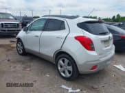 ✅ 2015 Buick Encore Leather • VIN: KL4CJCSB5FB218856 • Лот: 42536416. Опубликован ранее на IAAI с пробегом 33 115 миль. Бесплатный доступ к архиву аукционных продаж из США и подробный отчёт об истории автомобиля на DreamBid. Изображение 3.