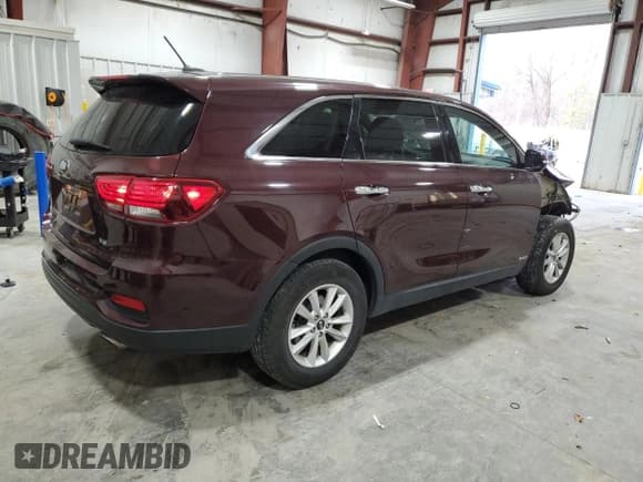 ✅ 2019 Kia Sorento LX • VIN: 5XYPGDA57KG522665 • Лот: 91425965. Опубликован ранее на Copart с пробегом 83 070 миль. Бесплатный доступ к архиву аукционных продаж из США и подробный отчёт об истории автомобиля на DreamBid. Изображение 3.