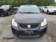 ✅ 2012 Suzuki SX4 LE • VIN: JS2YC5A3XC6304007 • Lot: 80989485. Listed on Copart with 178,892 mi. Free auction sales archive from the USA and detailed vehicle history report at DreamBid. Image 5.