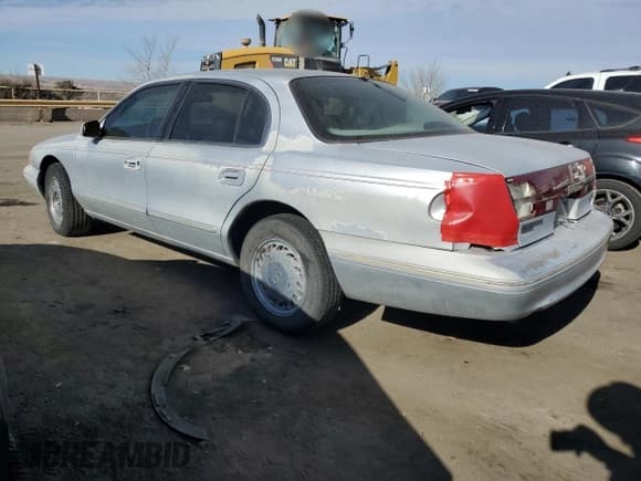 ✅ 1996 Lincoln Continental • VIN: 1LNLM97V3TY627803 • Лот: 87036654. Опубликован ранее на Copart с пробегом 118 078 миль. Бесплатный доступ к архиву аукционных продаж из США и подробный отчёт об истории автомобиля на DreamBid. Изображение 2.