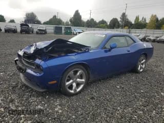 ✅ 2012 Dodge Challenger SXT Plus • VIN: 2C3CDYAG4CH290985 • Лот: 82078265. Опубликован ранее на Copart с пробегом 162 825 миль. Бесплатный доступ к архиву аукционных продаж из США и подробный отчёт об истории автомобиля на DreamBid. Изображение 1.