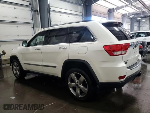 ✅ 2012 Jeep Grand Cherokee Overland • VIN: 1C4RJFCG7CC324310 • Lot: 84262345. Listed on Copart with 155,354 mi. Free auction sales archive from the USA and detailed vehicle history report at DreamBid. Image 2.