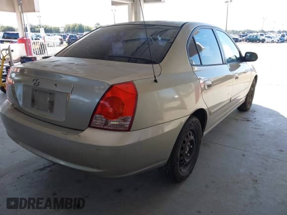 2005 Hyundai Elantra GLS z VIN KMHDN46D15U962839, wystawiony jako IAAI lot #43519523 z przebiegiem 155 453 mil mil oraz . Historia ofert i sprzedaży dostępna na DreamBid. Obrazek 4.