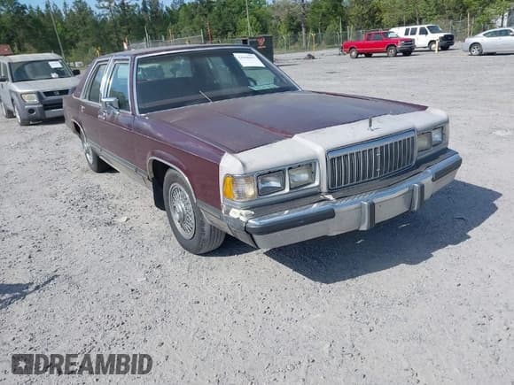 ✅ 1990 Mercury Grand Marquis • VIN: 2MECM74F9LX614526 • Lot: 42068697. Listed on IAAI with 4,875 mi. Free auction sales archive from the USA and detailed vehicle history report at DreamBid. Image 1.