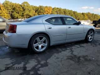 2007 Dodge Charger SRT-8 с VIN 2B3LA73W17H787535, выставлен на аукционе Copart как лот 78386124 с пробегом 173 263 миль миль и Списание • Salvage title. История ставок и продаж доступна на DreamBid. Изображение 3.