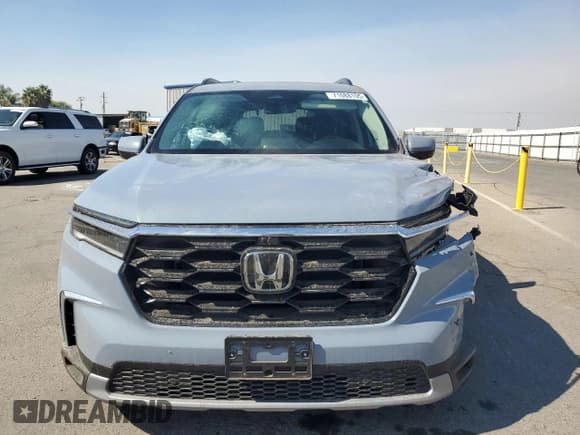 ✅ 2024 Honda Pilot Elite • VIN: 5FNYG1H82RB000921 • Лот: 84777185. Опубликован ранее на Copart с пробегом Не указан. Бесплатный доступ к архиву аукционных продаж из США и подробный отчёт об истории автомобиля на DreamBid. Изображение 5.