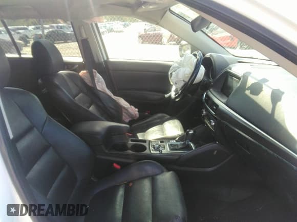 ✅ 2016 Mazda CX-5 Grand Touring • VIN: JM3KE2DY0G0695894 • Lot: 43441374. Wystawiony na IAAI z przebiegiem 112 838 mil. Bezpłatny archiwum sprzedaży aukcyjnych z USA i szczegółowy raport historii pojazdu na DreamBid. Zdjęcie 5.