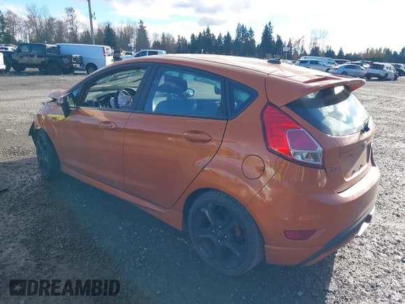 ✅ 2018 Ford Fiesta ST • VIN: 3FADP4GX7JM132734 • Lot: 43736268. Listed on IAAI with 207,359 mi. Free auction sales archive from the USA and detailed vehicle history report at DreamBid. Image 3.