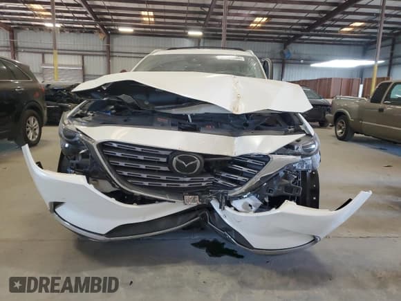 ✅ 2022 Mazda CX-9 Signature • VIN: JM3TCBEY0N0620425 • Лот: 92033295. Опубликован ранее на Copart с пробегом 47 154 миль. Бесплатный доступ к архиву аукционных продаж из США и подробный отчёт об истории автомобиля на DreamBid. Изображение 5.