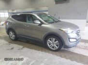 ✅ 2015 Hyundai Santa Fe • VIN: 5XYZWDLA4FG268392 • Lot: 52363955. Listed on Copart with 130,286 mi. Free auction sales archive from the USA and detailed vehicle history report at DreamBid. Image 4.