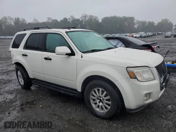 2010 Mercury Mariner Premier с VIN 4M2CN9HG1AKJ28171, выставлен на аукционе Copart как лот 80882805 с пробегом 124 347 миль миль и Списание • Salvage title. История ставок и продаж доступна на DreamBid. Изображение 4.