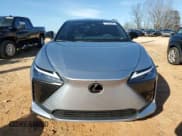 ✅ 2024 Lexus RZ 300e Premium • VIN: JTJABABB8RA005034 • Lot: 43785845. Listed on Copart with 2,167 mi. Free auction sales archive from the USA and detailed vehicle history report at DreamBid. Image 5.