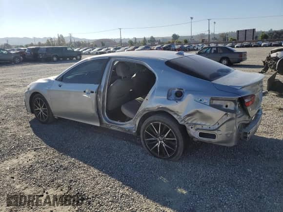 2021 Toyota Camry Hybrid SE с VIN 4T1G31AK7MU556263, выставлен на аукционе Copart как лот 84229075 с пробегом 104 650 миль миль и Списание • Salvage title. История ставок и продаж доступна на DreamBid. Изображение 2.