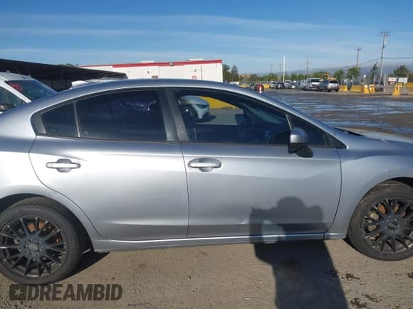 ✅ 2017 Subaru Impreza Premium • VIN: 4S3GKAD68H3611434 • Lot: 43128256. Listed on IAAI with 145,290 mi. Free auction sales archive from the USA and detailed vehicle history report at DreamBid. Image 14.