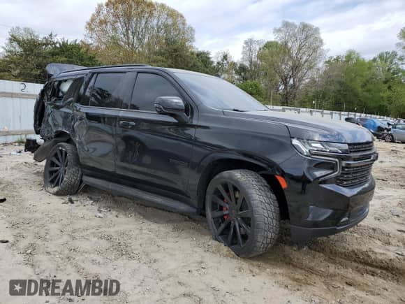 2022 Chevrolet Tahoe RST with VIN 1GNSKRKD0NR338287, listed as a Copart auction lot 53679345 with 59,010 mi miles and Salvage title. Bid and sale history available at DreamBid. Image 4.