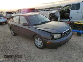 2003 Hyundai Elantra GLS z VIN KMHDN45D53U572664, wystawiony jako Copart lot #82387214 z przebiegiem Nie podano mil oraz Szkoda całkowita • Salvage title. Historia ofert i sprzedaży dostępna na DreamBid. Obrazek 4.