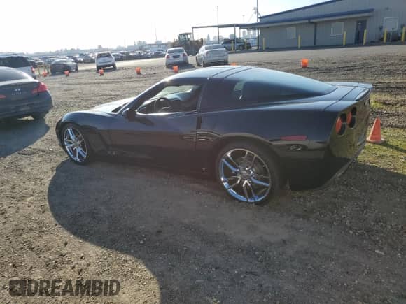 2007 Chevrolet Corvette with VIN 1G1YY25U875118015, listed as a Copart auction lot 82585534 with 161,401 mi miles and Salvage title. Bid and sale history available at DreamBid. Image 2.